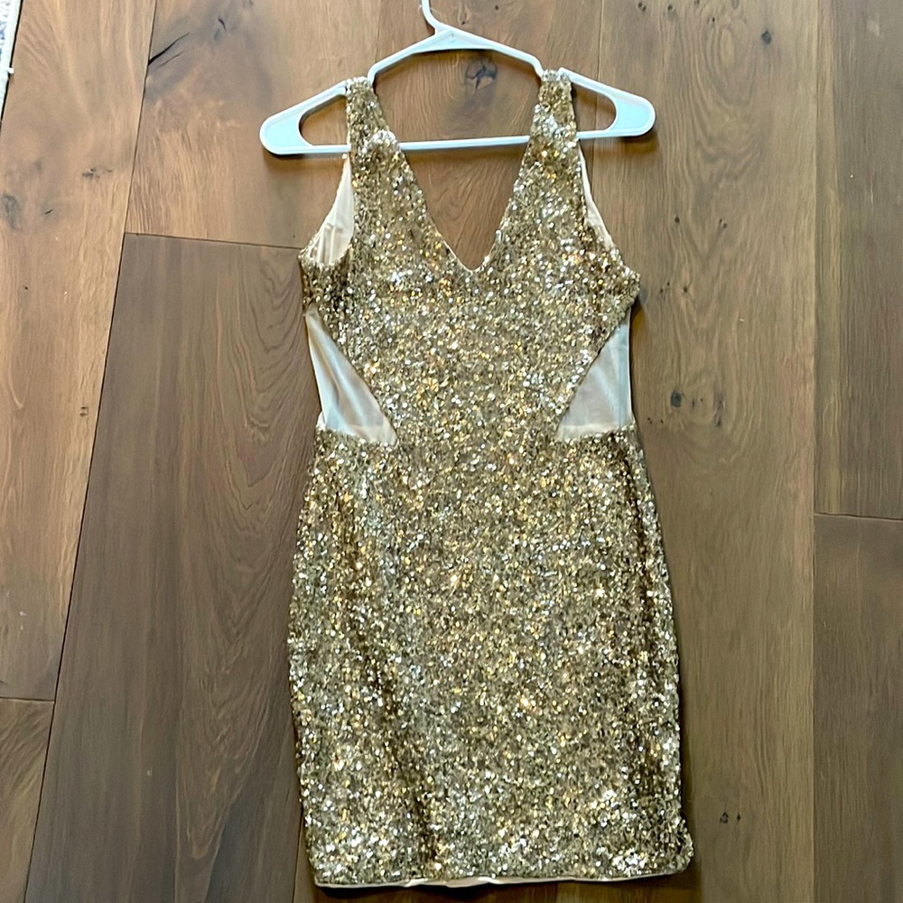Gold sequin dress with mesh cut out sides